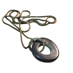 Modernist Carved Wheel Shaped Pendant on Long Chain Art Teacher Vibes